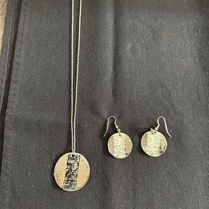 Tiffany and Company Silver necklace with pendant and dangling matching earrings.